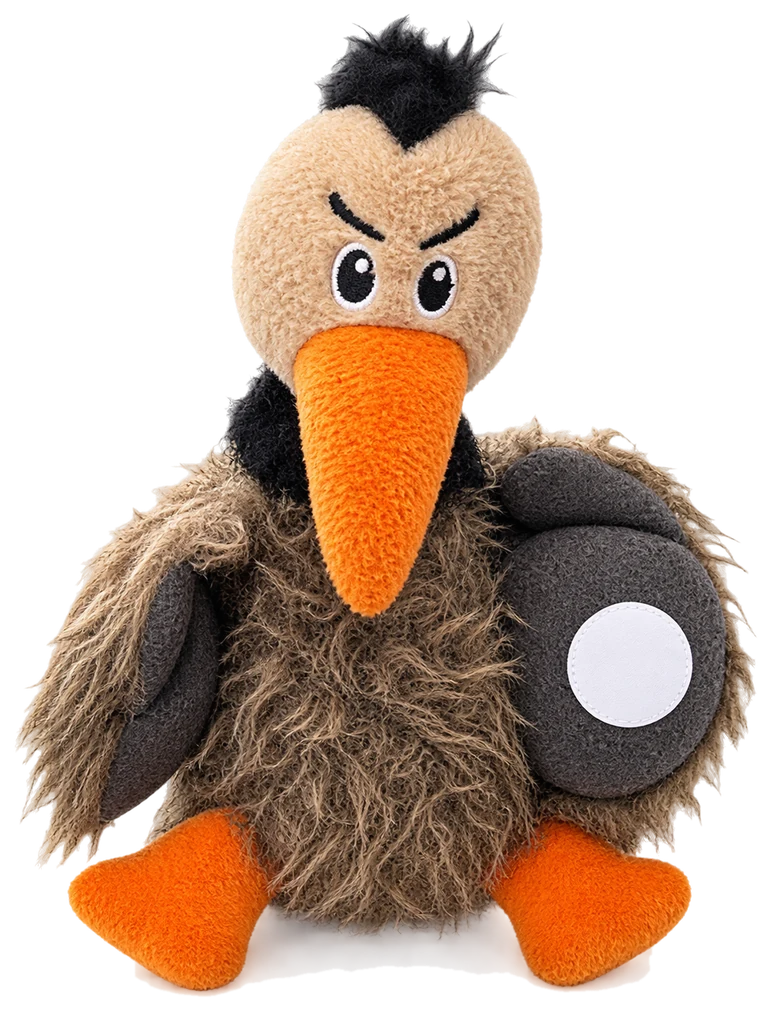 The Pasiero plushie, a fuzzy brown bird with an orange beak and feet, with a round tap tag on one wing.